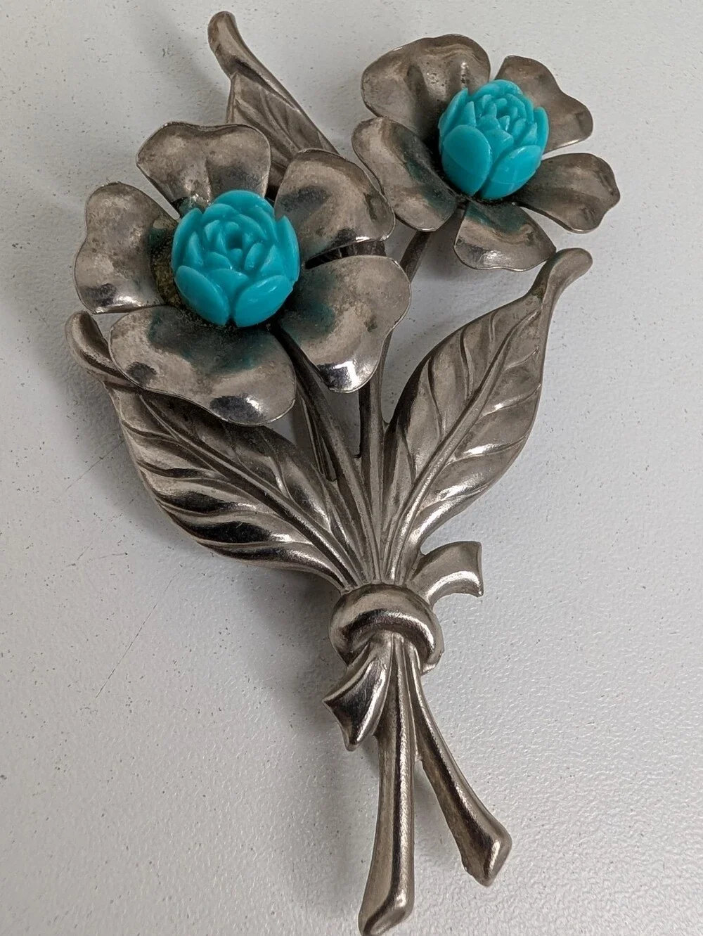 Silver Tone Floral Brooch with Molded Turquoise Resin Roses